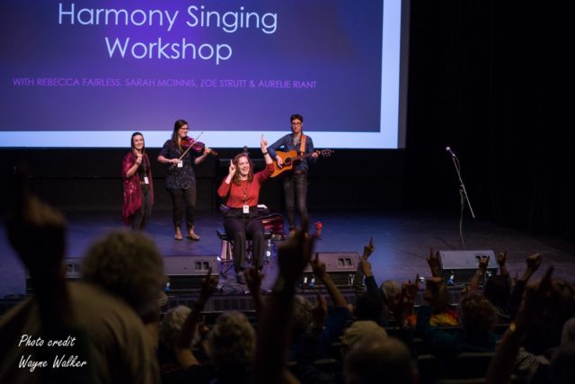 Deep Roots Harmony Singing Workshop - singers leading audience singing